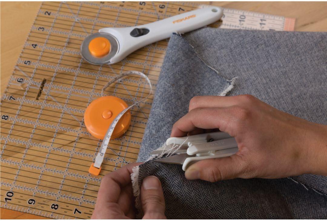 imageFiskars Crafts Essentials 5Piece Set  45mm Blade Rotary Cutter for Fabric Self Healing Cutting Mat and Sewing Ruler  Craft Supplies  WhiteGray