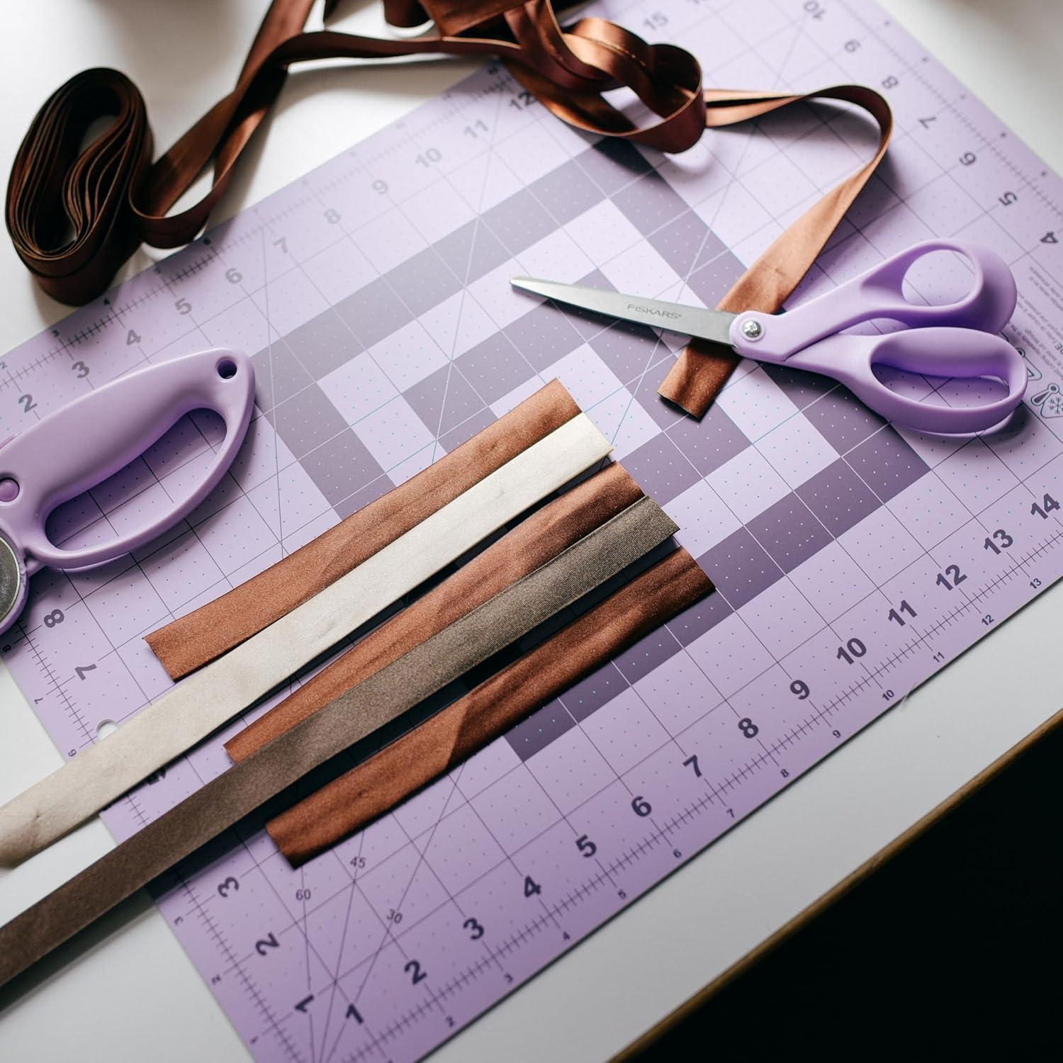 imageFiskars Self Healing Cutting Mat for Quilting Arts and Crafts 18quot x 24quot Grid Sewing Mat Craft Cutting Board Sewing Supplies and Quilting ToolsLilac