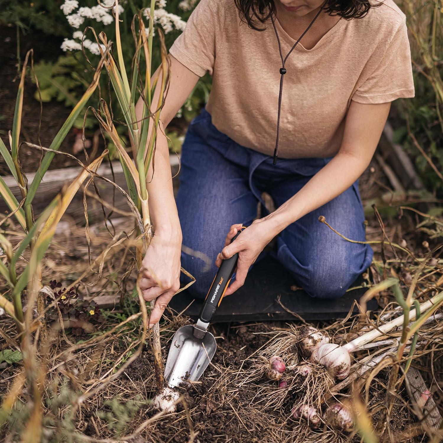 imageFiskars Xact Hand Rake Heavy Duty Gardening Hand Tool with Ergonomic Handle and Hanging Hole for Storage Stainless Steel Head and Tines Perfect for Maintaining a Raised Garden BedTrowel