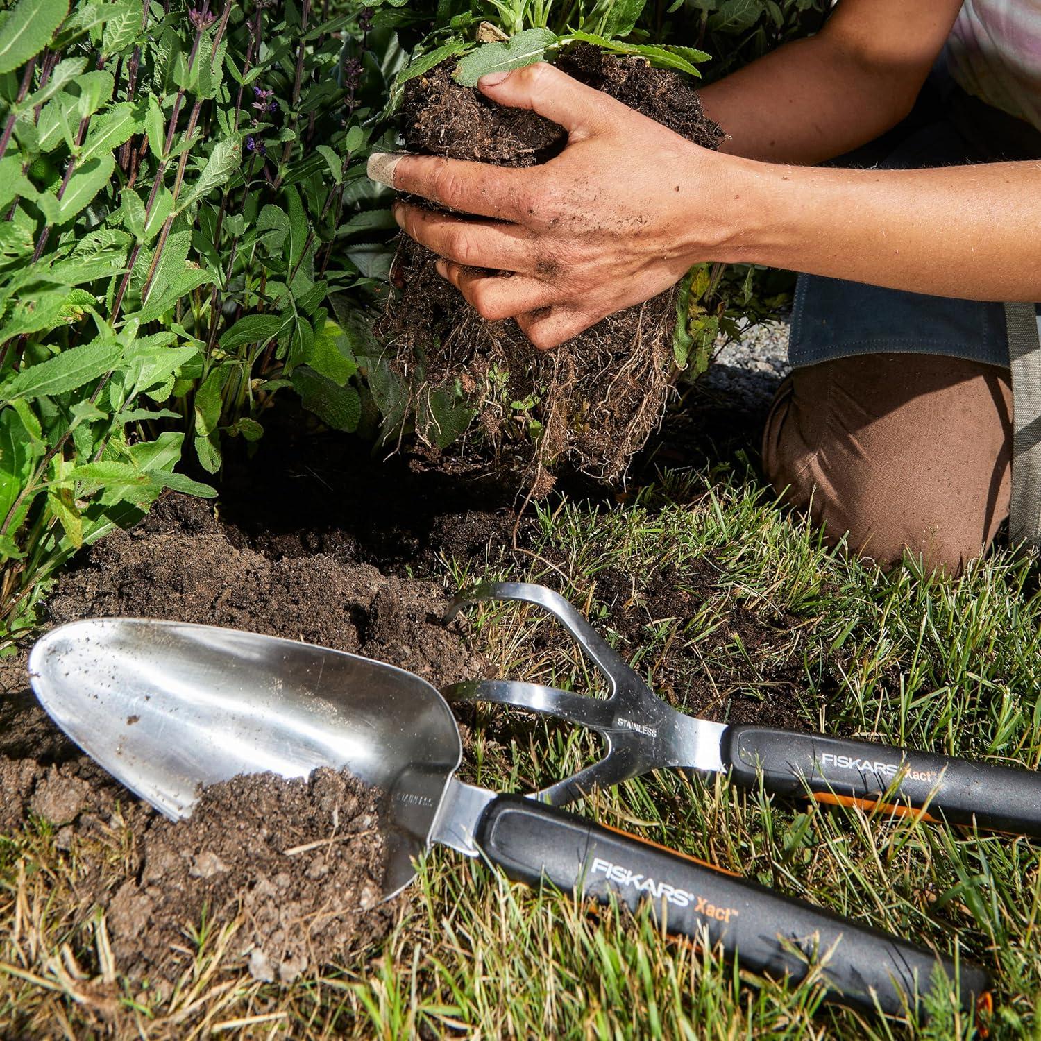 imageFiskars Xact Hand Rake Heavy Duty Gardening Hand Tool with Ergonomic Handle and Hanging Hole for Storage Stainless Steel Head and Tines Perfect for Maintaining a Raised Garden BedCultivator