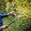 imageFiskars 23Inch Hedge Shears Bush Trimmer with PowerGear2 Technology that Multiplies Power for Less Effort SoftGrip Handles with ShockAbsorbing BumpersPowerGear 23 in