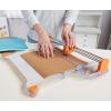 imageFiskars ProCision Rotary Bypass Paper Trimmer  12quot Cut Length  Craft Paper and Mixed Media Cutter with Grid Lines  OrangeFolding Rotary Bypass Trimmer  12