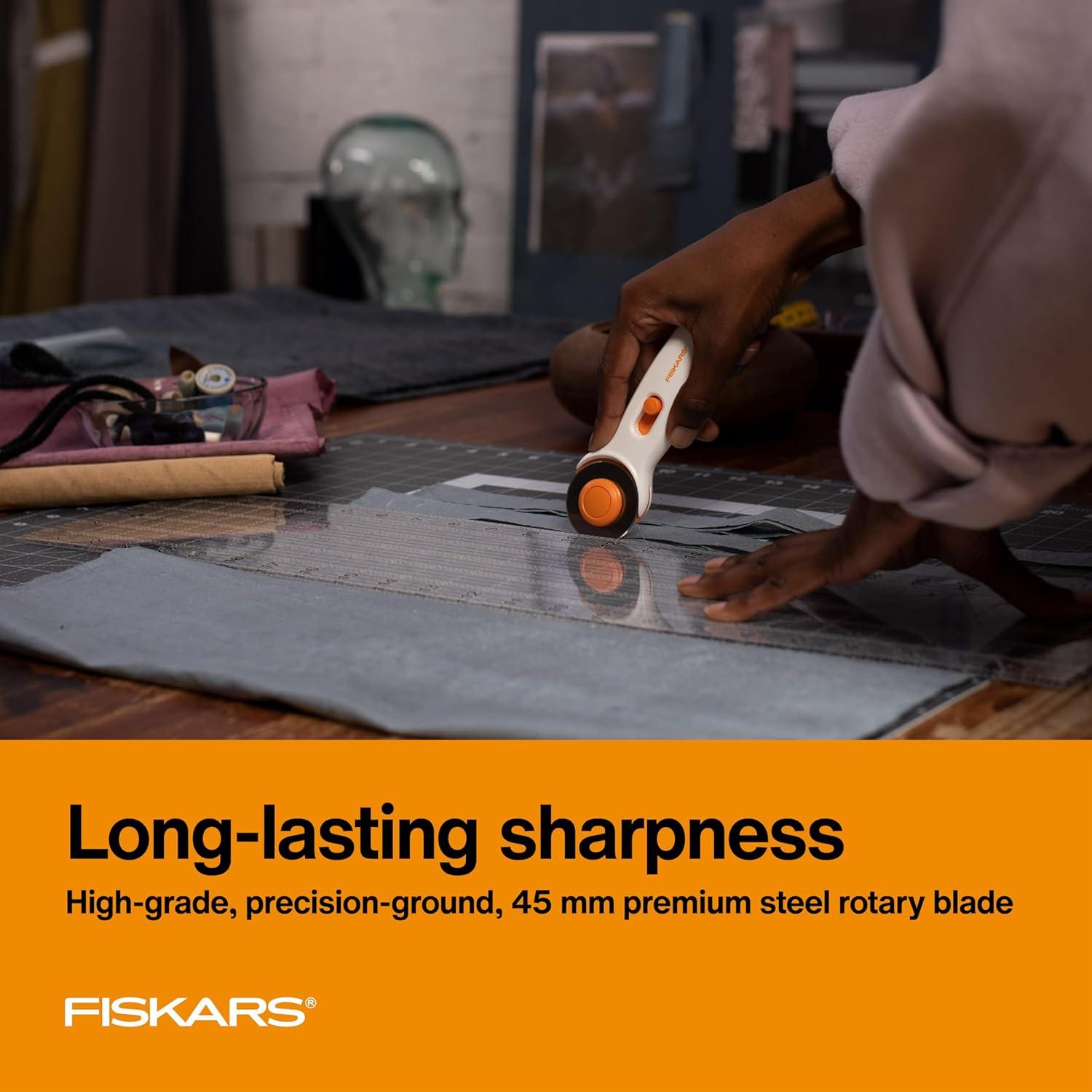 imageFiskars 45mm Rotary Cutter for Fabric Premium Steel Stick Fabric Cutter Cuts Through Multiple Layers Right and Left Handed Easy and Safe Blade Change Arts and Crafts Sewing and Quilting ToolsPremium Stick