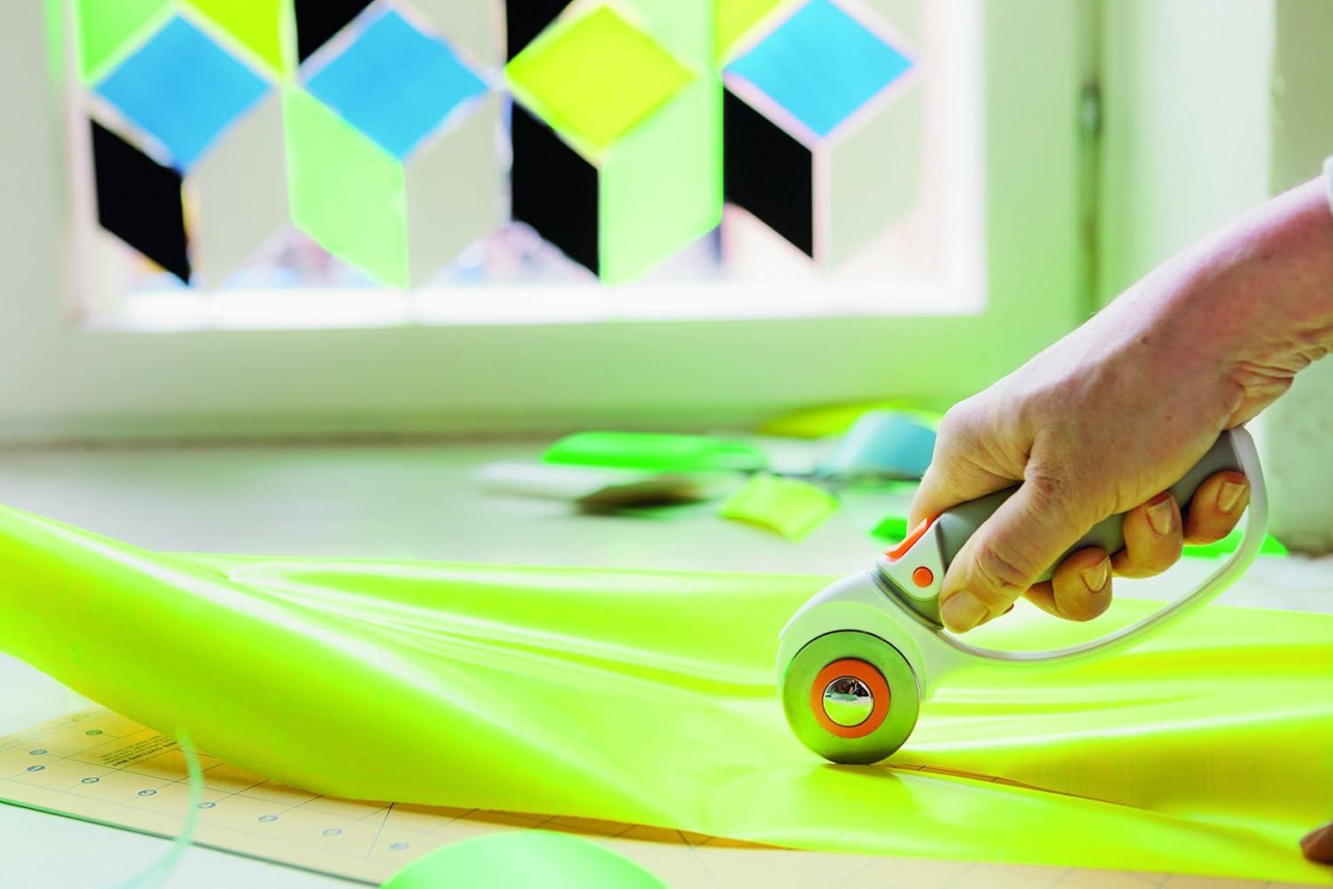 imageFiskars 45mm Rotary Cutter for Fabric Premium Steel Stick Fabric Cutter Cuts Through Multiple Layers Right and Left Handed Easy and Safe Blade Change Arts and Crafts Sewing and Quilting Toolssteel and orange