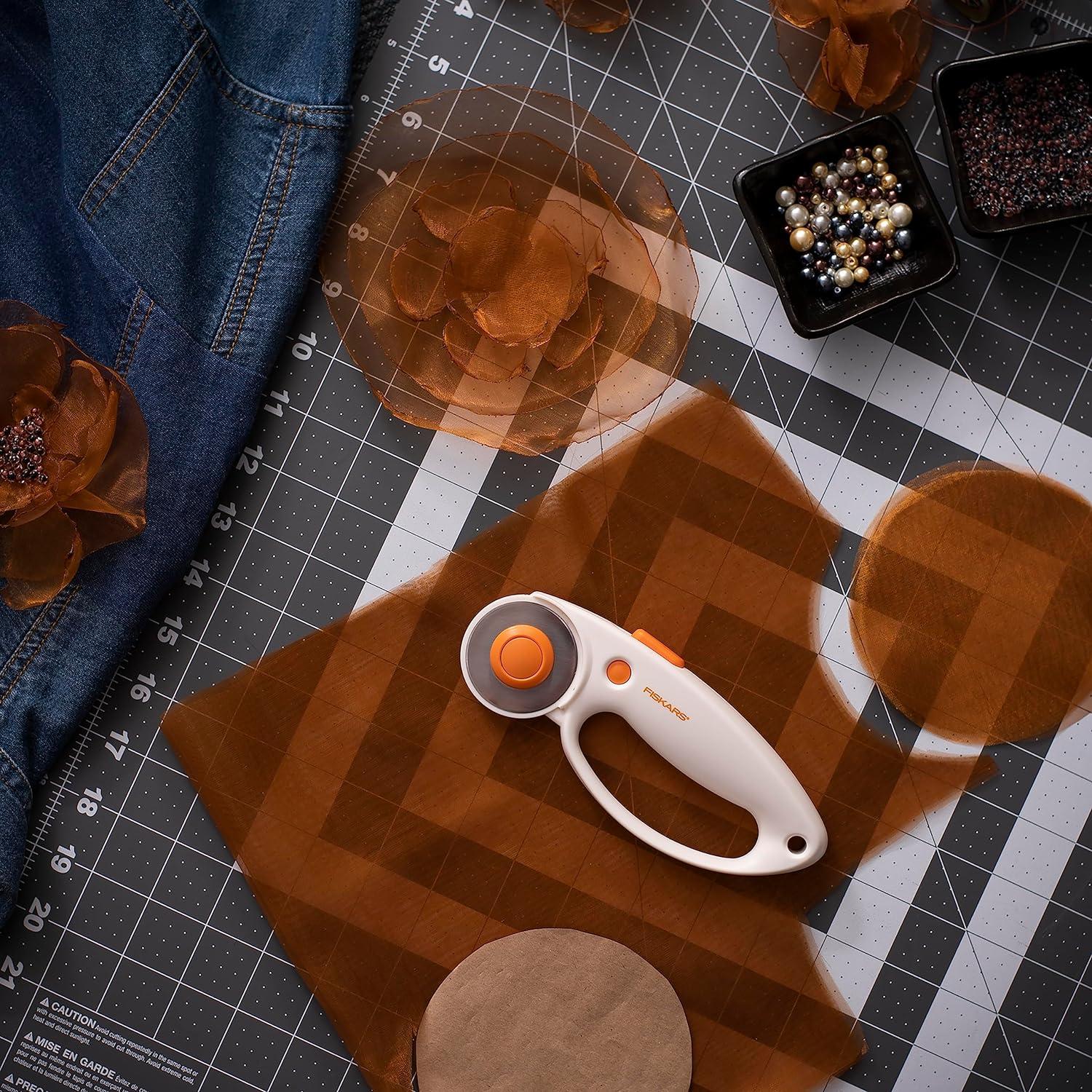 imageFiskars 45mm Rotary Cutter for Fabric with Ergonomic Loop Grip Premium Steel Rotary Fabric Cutter Blade for Precise Cuts Arts and Crafts Sewing Supplies and Quilting Tools