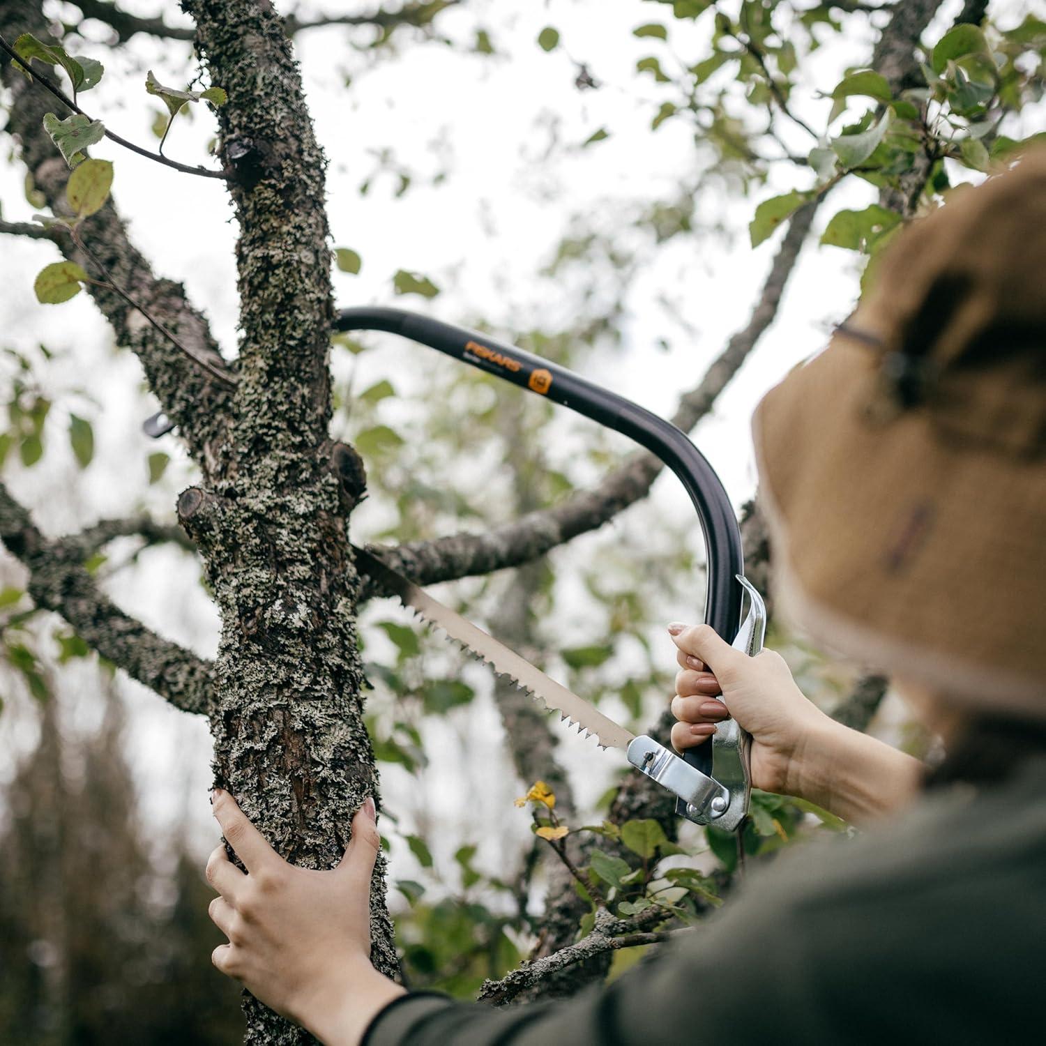imageFiskars Hand Saw Folding Saw with Dual Position Locking Saw Blade for Overhand Cuts and Under Cuts and Power Tooth Blade with Triple Ground Teeth Soft Grip 10Inch Pruning SawBow Saw