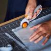 imageFiskars 45mm Rotary Cutter for Fabric Premium Steel Stick Fabric Cutter Cuts Through Multiple Layers Right and Left Handed Easy and Safe Blade Change Arts and Crafts Sewing and Quilting ToolsTitanium