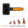 imageFiskars Pet Massage Brush Cat and Dog Brush Flexible Silicone Bristles ampamp SoftGrip Handle for Gentle Deshedding 65 OrangeBlack